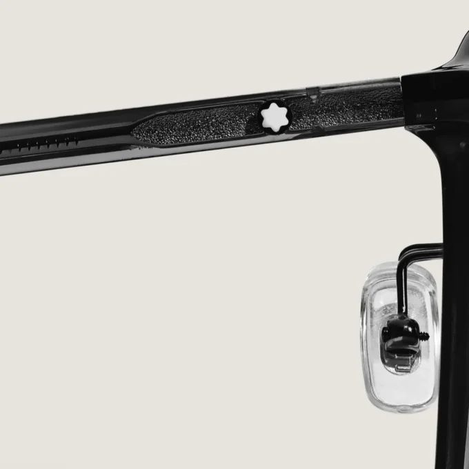 Ovale solbriller med sort acetatstel