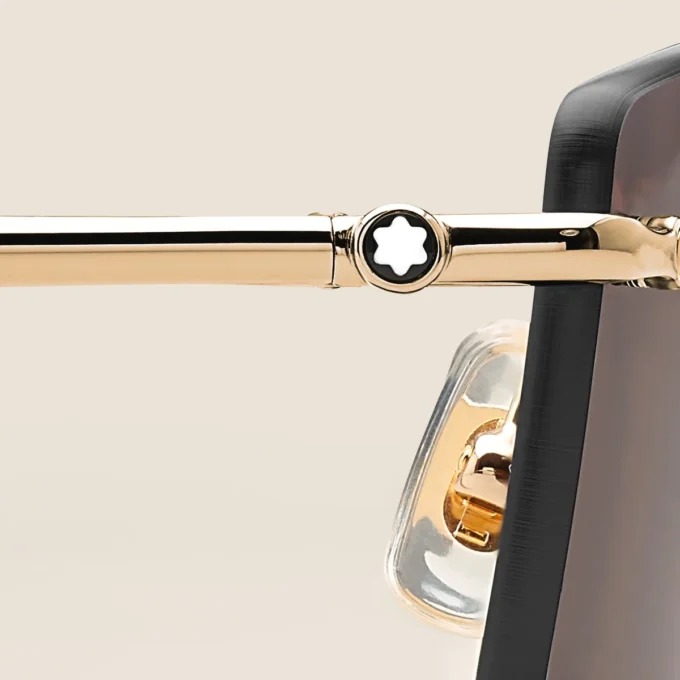 Rektangulære solbriller med guldfarvet metalstel Rektangulære solbriller med guldfarvet metalstel