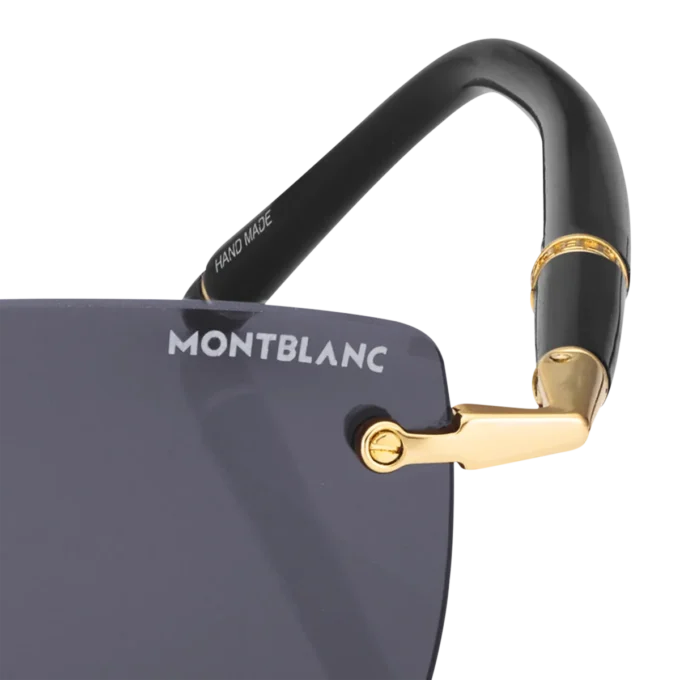 Rektangulære solbriller med guldfarvet metalstel Rektangulære solbriller med guldfarvet metalstel