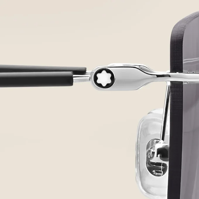 Rektangulære solbriller med sølvfarvet metalstel Rektangulære solbriller med sølvfarvet metalstel